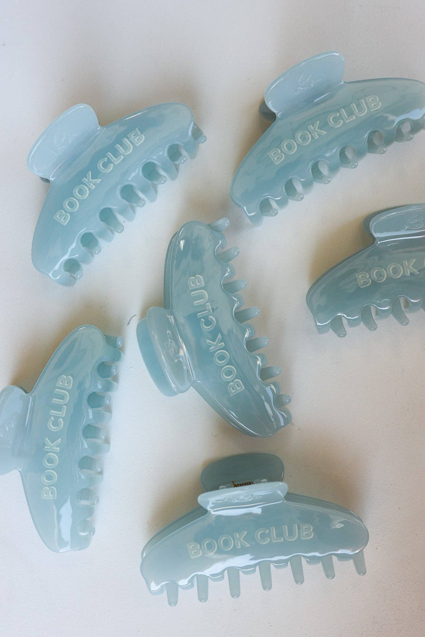 Book Club Claw | KAXI