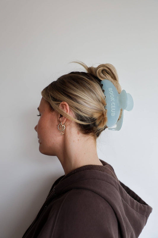 Book Club Claw | KAXI