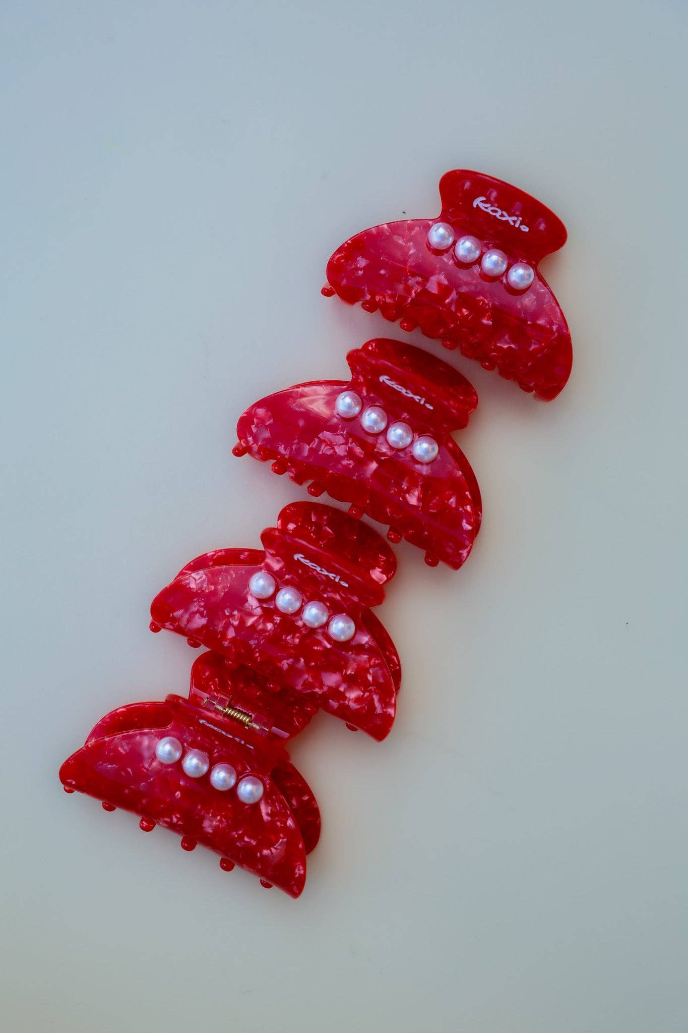 Holiday Pearl Claw | KAXI