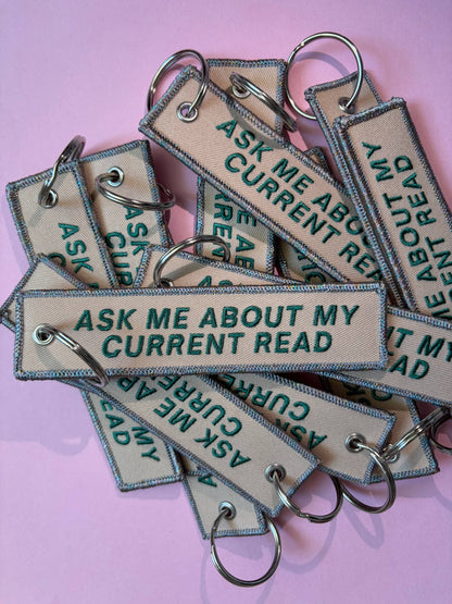 Ask Me About My Current Read Keychain