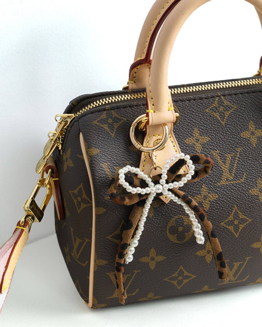 Lana Leopard Pearl Bow Bag Charm