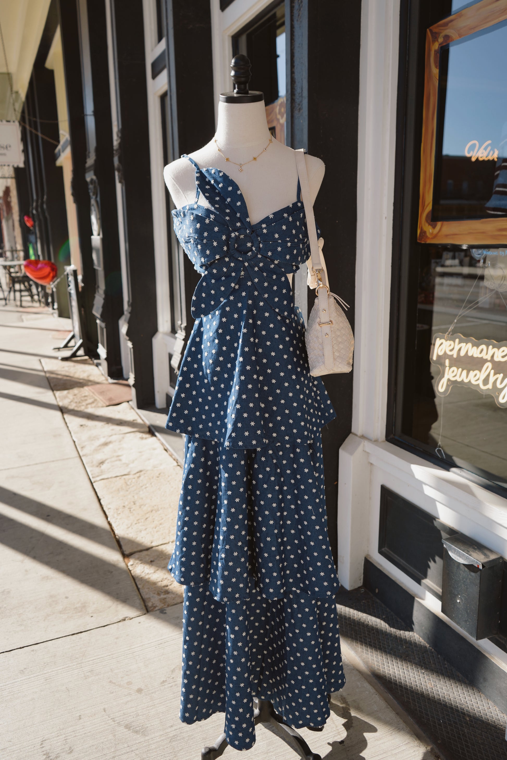 denim tiered maxi dress Judith Long Sleeve Denim tiered midi dress with long sleeves and a button snap front Ditsy Denim Floral Tiered Maxi