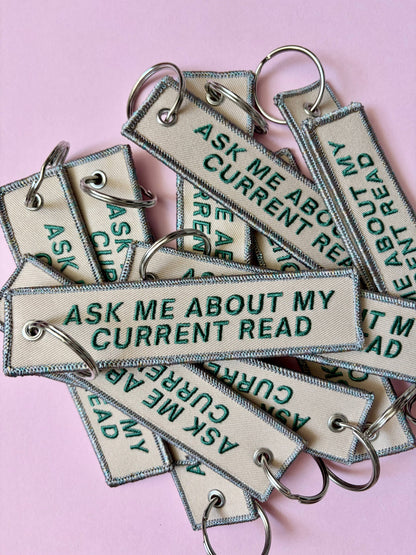 Ask Me About My Current Read Keychain