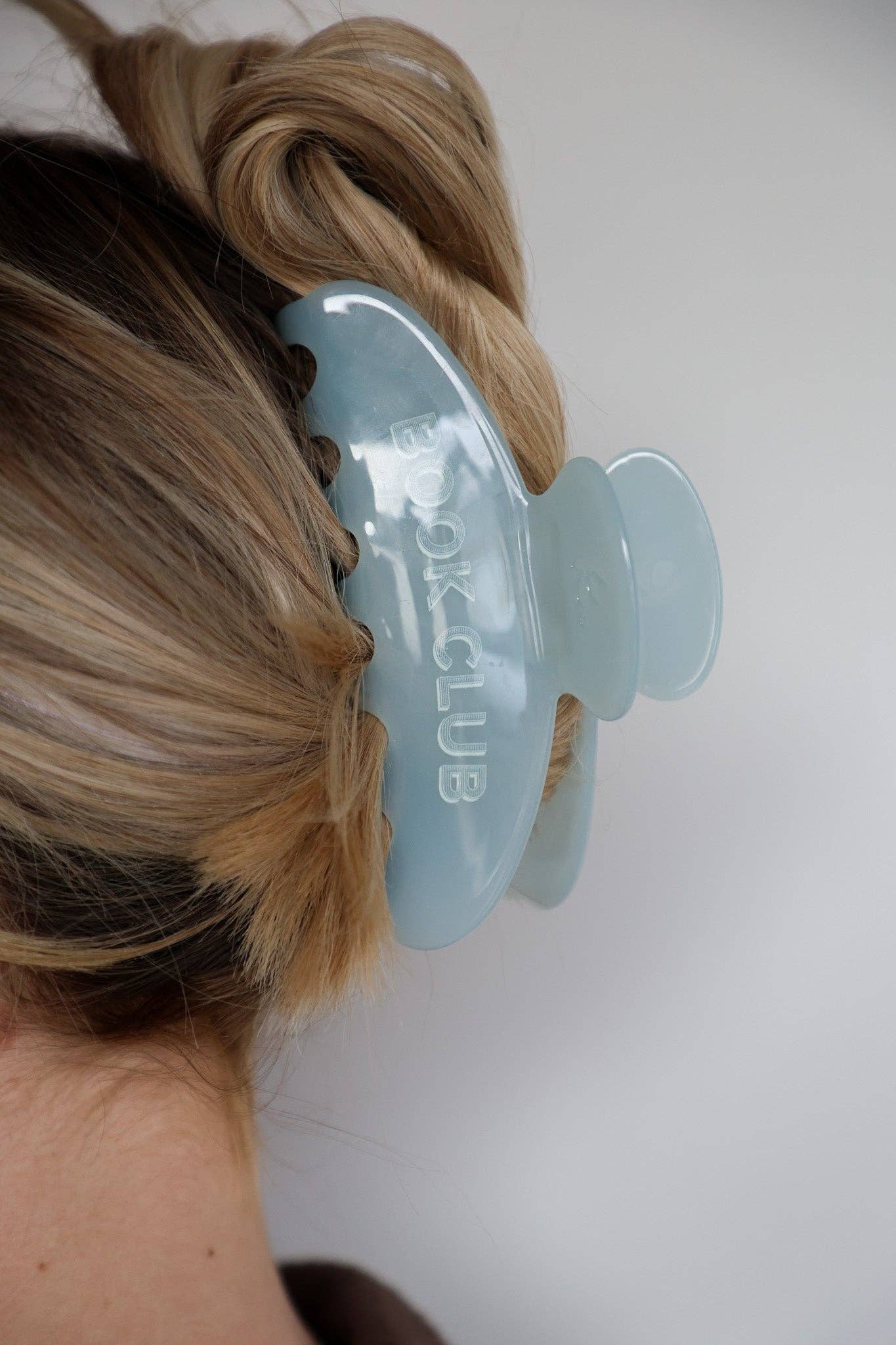 Book Club Claw | KAXI