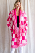 light pink and hot pink knit checker cardigan with fringe edging